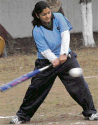 Aditi from Andhra Pradesh plays softball during the National School Games in Chandigarh. 