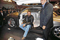 Film star Sanjay Dutt (L) with Dilip Chhabria, well-known car designer, at the launch of Ambierod super luxury car at the 9th Auto Expo in New Delhi on Thursday.