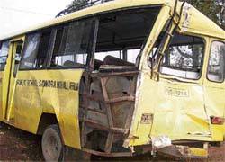The damaged school bus at the accident site.