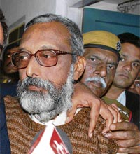 Fugitive IPS officer Bidya Bhusan Mohanti surrenders at a court in Jaipur on Thursday.