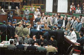 Legislators from the Panthers Party, the State Morcha and the BJP protesting near the well in lower house on Thursday. Demonstrations by Jammu-based parties rocked the House for the second successive day on framing of delimitation commission.