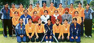 Winning team with the college staff.