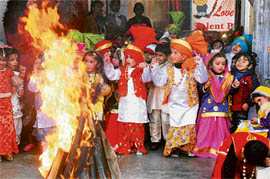 Students of Love Dale School celebrate Lohri on the school campus in Ludhiana on Friday.