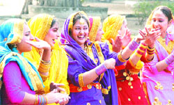 Students of Government College of Education perform giddha to celebrate Lohri.