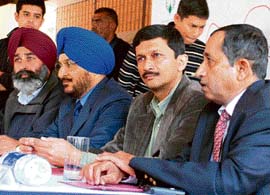 From left: Kulbir Singh Brar, Sukhjeet Singh Lehal, Vivek Atray and Wg Cdr Satish Aparajit answer queries about the LG All-India Amateur Golf Championship at the Chandigarh Golf Club on Sunday. 