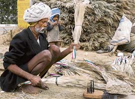 On chilly Sunday when people confined themselves indoors, Nazu, an 80-year-old worker from Bhilwara, Rajasthan, was busy making brooms along the GT Road in Karnal.
