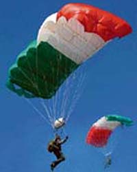 Paragliders of the special force perform para jumping from 6,000 ft during Know Your Army exhibition in Jammu on Sunday.