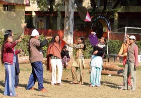 Girls enjoying a kite-flying session on the occasion of Lohri in Ludhiana on Sunday.
