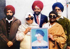 (From left) Basant Singh Behal, Raghbir Singh Behal and Karamjit Singh Behal, sons of late Jagat Singh Behal, with recipients of cornea transplant.