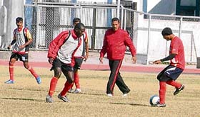 Players of Kingfisher East Bengal along with their coach during a practice session at Guru Nanak Stadium, Ludhiana, on Sunday, ahead of their 11th round match of ONGC Indian Premier Football League with JCT. 