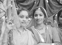 Boys perform while (right) girls wait for their turn during a cultural programme at DAV Public School in Patiala