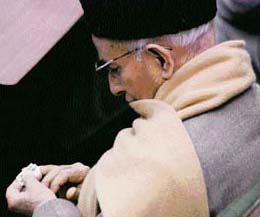 A Jammu and Kashmir legislator finds enough time to cut his nails inside the assembly hall after the speaker adjourned the house in Jammu on Monday. 