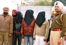 Three members of a Rajen gang who were running an extortion racket from inside the central jail in Ludhiana on Monday. 