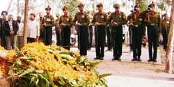 Soldiers reverse arms as a mark of respect to Kuldeep Singh at Kanganwal village, near Ahmedgarh, on Monday.