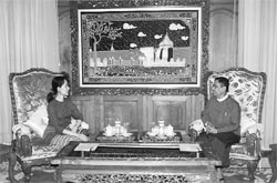 Myanmars Labour Minister Aung Kyi (right) meets pro-democracy leader Aung San Suu Kyi in Yangon on January 11, in what was seen as a positive development.
