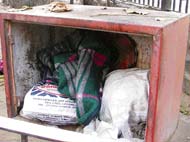 Employees of the multi-storeyed parking of the municipal corporation use water hydrants for fire fighting as almirahs for storing clothes.