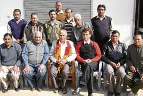 Office-bearers of the BJP with unit president Vijay Kumar Goyal (garlanded) at Ahmedgarh on Tuesday.