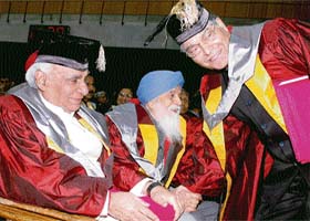 Prof G.K.Chadha, former vice-chancellor, JNU, congratulates Yash Chopra, noted film director and producer, and Dr Pritam Singh after receiving honouris causa degrees in D litt during the 57th annual convocation of Panjab University in Chandigarh