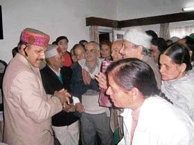 Health Minister Rajiv Bindal meeting people during a khula darbar at Solan on Wednesday. 