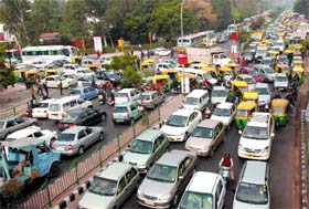 A heavy traffic jam in front of Pragati Maidan due to last day of 9th Auto Expo-2008 and rehearsal for Republic Day parade on Rajpath in the Capital