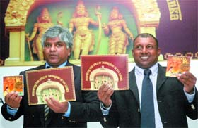 Former Sri Lankan cricketers Arjuna Ranatunga and Arvinda D'Silva release a DVD for promoting religious-cultural tourism during the unveiling of 'Asokavatika' by Sri Lankan government in the Capital