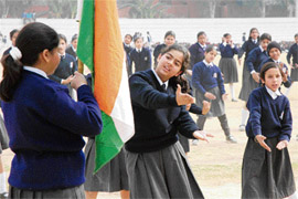 Students do a rehearsal for the Republic Day celebrations at Karan Stadium in Karnal on Thursday. 