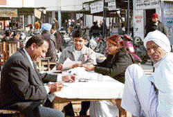 Advocates in the Ambala court complex are forced to sit in the open due to the unavailability of chambers