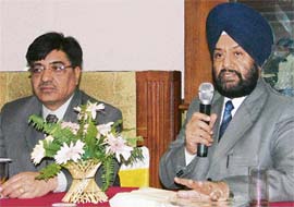 Dr Amarjit Singh Rattan addresses a news conference in Ludhiana.