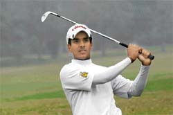 Rahul Bakshi braves foggy conditions as he takes a hit in the LG Indian Open Amateur Golf Championship at the Chandigarh Golf Club on Friday