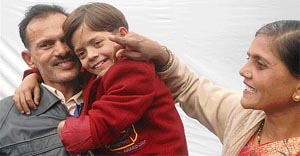 National bravery award winner Ankit Rai of Haryana along with his parents in New Delhi on Friday.