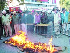 The mob also burnt tyres and blocked traffic.