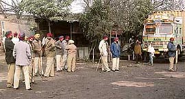 Police personnel deployed at the dry port following tension between coal merchants in Ludhiana on Friday.