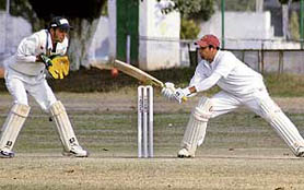 Players in action during Punjab State Inter-District Senior FC Mittal Trophy Cricket Tournament at the PAU in Ludhiana on Friday.
