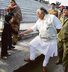 Hi, Im Jairam Ramesh, minister of state for commerce seems to tell a boy at the Attari joint checkpost on Friday.