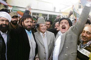 Supporters rally behind Peerzada Mohammad Sayeed at his residence in Jammu on Saturday.