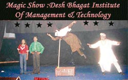 G.C. Sarkar shows a trick at a magic show at Desh Bhagat Institute, Mandi Gobindgarh