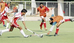 A match in progress during the North Zonal Inter-Varsity Hockey Tournament being played at Prithpal Singh AstroTruf Stadium in Ludhiana