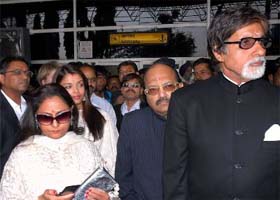 Actor Amitabh Bachchan, along with his wife Jaya Bachchan, daughter-in-law Aishwarya Rai Bachchan and Samajwadi Party leader Amar Singh arrives at the Raja Bhoj airport in Bhopal