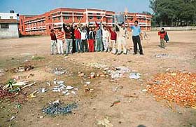 Residents protest in the playground of Government Senior Secondary School at Mullapur Garibdass