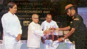 Brig Ajai Prakash, commandant, Garhwal Rifles Regimental centre, receives Indira Gandhi Paryavaran Puraskar from Pranab Mukherjee