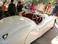 Cars wait for a 'Haig Vintage Rally' organised by Heritage Motoring Club of India at Khan Market in the Capital on Sunday.