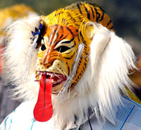 An artiste rehearses for the Republic Day parade at Rajpath in the Capital on Sunday.