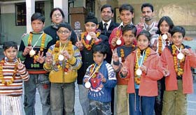 Students of Saraswati Modern School, Ludhiana, who won10 medals in the second Indo-Nepal Budo Kai-Do Karate Championship held at Dhuri.