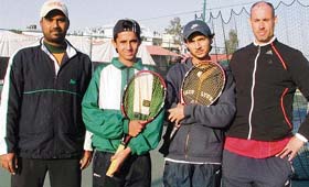 Syed Abbas, Syed Zohair along with their trainers at Harvest Tennis Academy. 