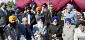 Lok Sabha deputy speaker Charanjit Singh Attwal and district SAD youth chief Gurpreet Singh Bhatti talk to mediapersons in Amloh on Sunday.
