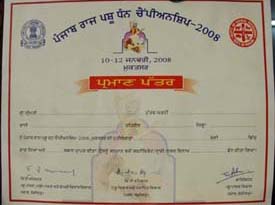 Original certificates duly signed by the authorities at the Punjab State Livestock Championship held at Muktsar recently. The certificate on the left does not have the bearers name while the one on the right bears a fictitious name. 