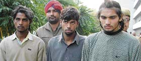 The accused in three murder cases, who were nabbed by the police in Ludhiana .