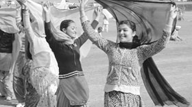 ITBP jawans rehearse for the Republic Day function; and (right) girls rehearse for the function in Patiala