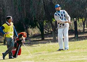 Harjinder Singh Kang gets a perfect chip shot on the 17th hole in the Chandigarh Golf Championship at the Chandigarh Golf Club