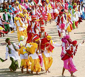 Students present bhangra at a full dress rehearsal of the Republic Day parade at Karan Stadium in Karnal on Thursday.